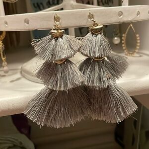 Feathered statement earrings